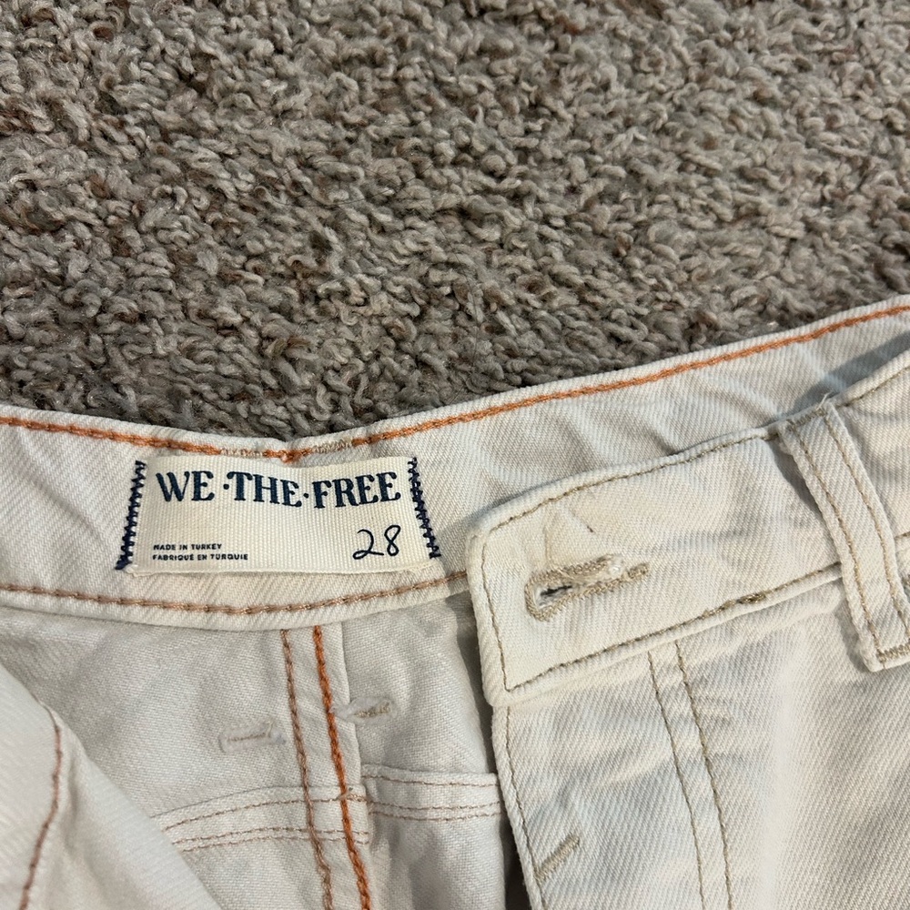 We The Free Cream Denim Jeans with Tan Leather Patch and Tan Stitching